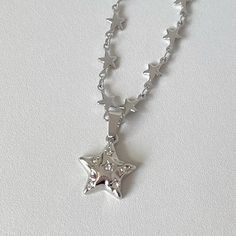 Stellar Shine Star Necklace - Necklaces Trendy Party Necklace With Star Charm, Trendy Silver Star Necklace, Metal Star Charm Jewelry, Star Shaped Metal Jewelry With Star Charm, Star Charm Jewelry For Parties, Trendy Star Embellished Jewelry For Parties, Trendy Star-embellished Party Jewelry, Trendy Star Embellished Party Jewelry, Party Necklaces With Star Charm