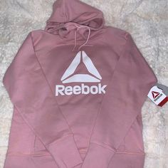 Stay Cozy In This Fleece By Reebok! Perfect For Lounging At Home Or Doing Errands. Made Of Soft Fleece Material This Is Best For Everyday Or Weekend Wear! Reebok Women's Athleisure Fleece Hoodie Comfy Sports Hoodie Activewear, Comfy Sports Activewear Hoodie, Comfy Hooded Activewear For Sports, Comfy Fleece Hoodie For Sports, Cozy Sports Activewear With Drawstring Hood, Cozy Activewear With Drawstring Hood For Sports, Comfy Sports Hoodie Sweatshirt, Cozy Sportswear Hoodie For Sports, Women's Athleisure