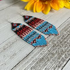 Native American Themed Seed Beaded Earrings Handmade Earrings Fringe Chevron Handmade Seed Beaded Fringe Earrings Made With 925 Sterling Silver Ear Hook And Glass Seed Beads. Native American Themed Colors - Black, Red, Tan, Blue, White Measurements Drop Length - 4 Inches Length With Ear Hook - 4.5 Inches Width - 1 Inch Care Instructions - To Maintain The Brightness Do Not Wear Them In Water. Made When Ordered Ships Within 2 Business Days Red White And Blue Beaded Earrings, Seed Beaded Earrings, Turquoise Gemstone Earrings, Beaded Fringe Earrings, Native American Beaded Earrings, Hoop Earrings Style, Handmade Earrings Beaded, Pumpkin Earrings, Beaded Earrings Patterns