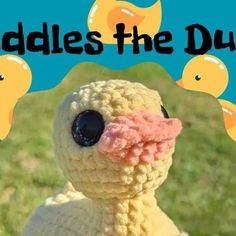 a crocheted ducky with rubber ducks in the background that says riddles the duck