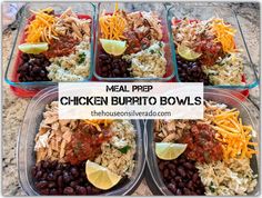 meal prepped chicken burrito bowls with black beans, rice and lime wedges