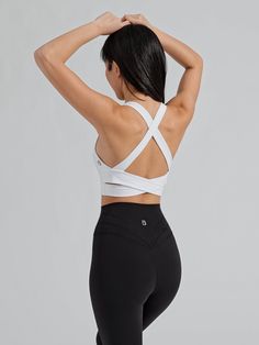 Features: Strappy criss-cross back design V-neckline Removable bust pads Details: Fabric: NuBre (Nylon/Spandex) Medium – High Support Level Description: The Alpha Sports Bra is a longline sports bra with a highly supportive V-shaped neckline that’s sure to highlight all your best features. The strappy back has two-strap criss-cross design and is made with our signature NuBre fabric for a soft, second skin feel and high stretch retention. Glute Bands, Non Slip Socks, White Sports Bra, The Alpha, Cross Design, Jogger Shorts, Black Sports Bra, Cross Designs, Short Shirts