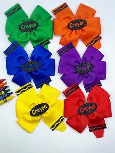 "Back to School Crayon Bows! * These bows measure approximately 4.5\" wide.  * Please choose what side you prefer clip to be worn on.  * Colors may vary from each screen due to monitor settings. PLEASE NOTE* Contains small parts. Please do not leave young children unattended while wearing any hair accessories. Remove before nap and bedtime." Costume Headbands, Back To School Bows, School Bows, Disney Hair Bows, Girls Hair Bows Diy, School Hair Bows, Bow Ideas, Hair Bow Sets, Diy Bows