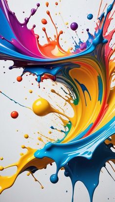 colorful paint splashing into the air on a white background