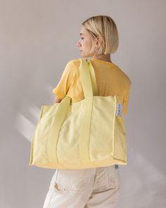 Sometimes you need a big cotton tote. For beach days, or pool days, or picnics, or last minute getaways, or shopping trips around town. Ours is of sturdy heavy cotton, with thick webbing handles, just like you, it gets the job done and looks flawless doing it. The flat bottom allows for easy packing and a magnetic closure makes getting in and out of it easy. So stack storage containers full of snacks, or fill with fresh towels ready for after that refreshing dip. Pair with the matching pouch for Everyday Use Large Capacity Cotton Beach Bag, Casual Cotton Canvas Bag For Weekend, Large Capacity Cotton Tote Beach Bag, Summer Cotton Canvas Bag, Canvas Beach Bag For Summer, Spring Travel Cotton Beach Bag, Summer Canvas Beach Bag For Spring, Spring Travel Beach Bag In Cotton, Casual Cotton Tote Weekender Bag