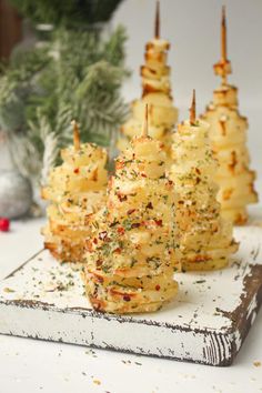 small appetizers are lined up on a tray