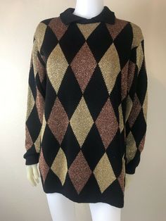 Glam meets preppy!  Women's vintage 1980's Alfred Dunner black with gold and copper diamond pattern knit sweater.  Pre-owned.  Good vintage condition.  Size medium.  Has stretch.  BUST=40 inches.  WAIST=39 inches.  SLEEVE LENGTH=22 inches.  WRIST=6 1/2 inches.  LENGTH=26 inches. Diamond Sweaters, Alfred Dunner Sweaters, Harlequin Pattern, Argyle Diamonds, Party Sweaters, Gold Copper, Favorite Sweater, Alfred Dunner, Pattern Sweater