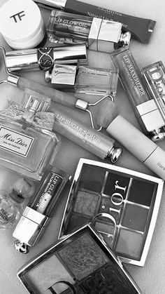 black and white photograph of various beauty products