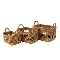 three woven baskets with handles and handles