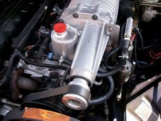 the engine compartment of a car is shown