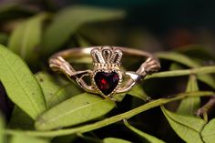 The Garnet Claddagh ring. Traditional Irish ring. Sign of love, loyalty, and friendship. The ring, as currently known, was first produced in the 17th century. Piece of our Celtic Jewelry collection. Best match of Garnet Promise Ring. : Main gemstone: Garnet Metal: Gold 585o (14K) Average weight: 2,7 gr. : * If desired, we can replace the main gem with any of the following: Amethyst, Alexandrite, Citrine, Emerald, Garnet, London Blue Topaz, Sky Topaz, Peridot, Smoky Quartz, Sapphire, Ruby. * If t Claddaugh Ring, Irish Wedding Rings, Irish Ring, Sign Of Love, Gold Claddagh Ring, Irish Ring Claddagh, Irish Rings, Irish Claddagh, Claddagh Ring