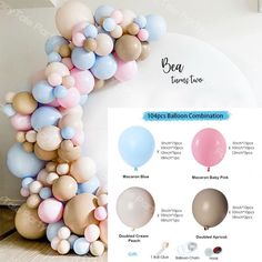 the balloons are arranged in different colors and sizes