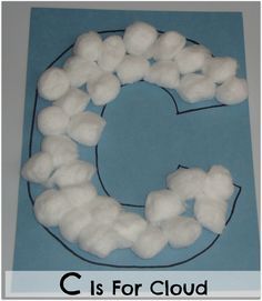 the letter c is for cloud made out of cotton floss on a blue background