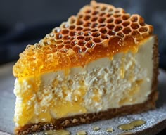 a piece of cheesecake with honey on top