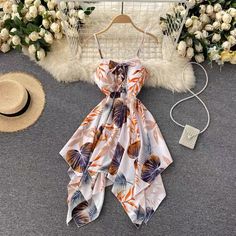 Spaghetti strap vacation dres, irregular, stylish, printed beach dressMaterial:blendedStyle:stylishFeatures:irregular,printedColor:apricot,blue,redSize(cm):free 1inch=2.54cmLength 91, bust 70-84 , waist:76&ltp&gtNote:Due to different measurement methods,there will be 1-3 error(unite:cm), please understand.</p>&ltbr/>&ltp&gtPlease check the size carefully when you choose items,thank you.</p>&ltbr/> Backless Summer Dress, Picnic Fashion, Cold Fashion, Printed Beach Dresses, Backless Dress Summer, Summer Dress Women, Irregular Dress, Preppy Dresses, Cute Dress Outfits