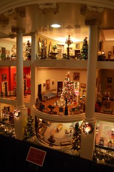 the inside of a building decorated for christmas