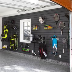 a garage with various sports equipment mounted to the wall