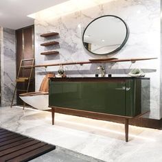 a modern bathroom with marble walls and flooring