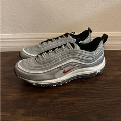 Nike Air Max 97 Metallic Silver Women’s Sneakers Dq9131-002 Silver Custom Casual Sneakers For Sports, Silver Casual Custom Sneakers For Sports, Silver Casual Sneakers For Sports, Slip-on Air Max Sneakers For Streetwear, Slip-on Sneakers With Air Cushioning For Streetwear, Nike Custom Casual Silver Sneakers, Silver Sneakers With Cushioned Footbed For Streetwear, Silver Streetwear Sneakers With Cushioned Footbed, Casual Silver Sneakers With Air Max Cushioning