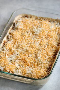 a casserole dish with cheese on top