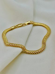 18k Gold Bismarck Bracelet, 4mm, 7.5", 4.710 gr . 18K solid gold bismark or Mesh chain bracelet is the best choice , because it is comfortable and flexible to use and easily adapts to every style.  Priced to sell! Compare our prices to other similar sellers! Arrives in a GIFT BOX and includes FREE SHIPPING within the USA and Canada. International shipping is available at the most economical rates on ETSY. I HAVE BEEN IN THE JEWELRY BUSINESS ALL MY LIFE. I am a second -generation family member ma Gold Flexible Snake Chain Bracelet, Gold Plated Flexible Chain Bracelet, Fast Replies, Bracelet Elegant, Gold Armband, Gold Bracelet For Women, Gold Link, Women Birthday, Mesh Bracelet