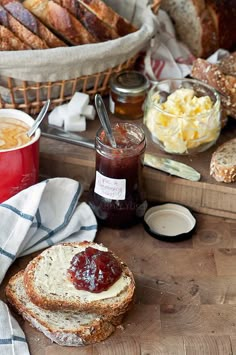 bread and jams on a wooden table