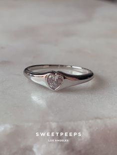 Classic Heart Signet Ring - Silver – SP Inc. White Dainty Heart Ring For Promise, Dainty White Heart Ring For Promise, White Heart Ring For Promise On Valentine's Day, White Heart Ring For Valentine's Day Promise, Classic White Heart Ring For Valentine's Day, Classic White Heart Promise Ring, Personalized White Heart Ring For Wedding, Personalized White Heart Cut Ring, Personalized White Rings For Valentine's Day