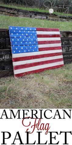 an american flag on the side of a wooden fence with text that reads, i'm