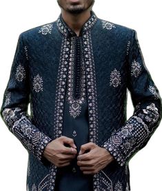 Traditional Blue Suit For Reception, Blue Traditional Wear With Dabka For Groom, Dabka Work Sets For Groom On Eid, Men Groom Outfit, Blue Sherwani For Groom At Eid, Blue Naqshi Sherwani For Wedding, Traditional Suits With Intricate Embroidery For Groom, Traditional Blue Bandhgala For Groom, Blue Dabka Bandhgala For Groom