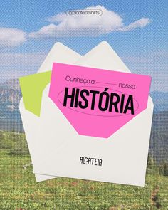 two envelopes with the word history written on them are in front of a mountain