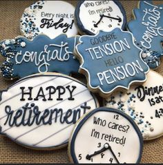 decorated cookies that say congratulations, tison, and happy retirement with words on them