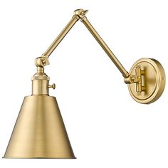 an antique brass wall light with a metal cone shade on the arm and two arms