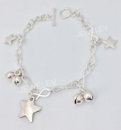 Star charmed on infinity bracelet, Sterling silver 925. 20 cm, 22 cm Star Charm Bracelet, Star Charms, Elevate Your Style, Infinity Bracelet, Silver 925, Your Style, 20 Cm, Silver Bracelet, Charm Bracelet