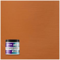 a can of rust brown metallic paint next to an orange wall with the word beyond on it