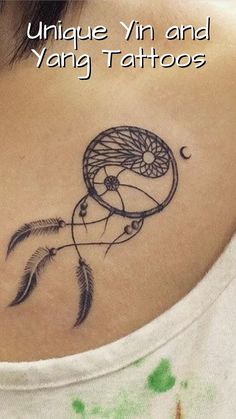 a woman with a tattoo on her back and the words unique yin and yang tattoos