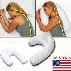 a woman laying on top of a pillow next to an inflatable u - shaped pillow