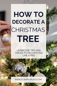 a person decorating a christmas tree with ornaments and text overlay how to decorate a christmas tree learn the tips and tricks to decor like a pro