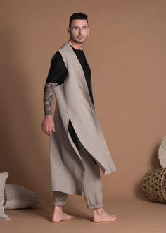 "Long Linen Sleeveless Jacket for Men for special occasions. This vest is made to order from medium-weight linen and is available in various colors. 🌿 DETAILS: - Open front vest - Sleeveless - High side slits - Asymmetric high low hem - 100% Natural linen in medium weight (185gr/m2) - Wide color palette, color shown is NATURAL FLAX - The length of the vest is about 135cm (53\"), please drop me a note if you need it shorter or longer. 🌿 SIZING & FIT Please note that this jacket is not one size, Long Vest Men, Mori Kei Men, Jedi Fashion, Sleeveless Jacket For Men, Sleeveless Jacket Men, Mens Tunic, Men Boho, Open Front Vest, Linen Vest