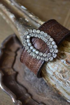 leather and rhinestone cuff Vintage Leather Bracelet Jewelry, Beaded Leather Cuff Bracelet Diy, Uses For Old Leather Belts, Vintage Leather Cuff Bracelet, Vintage Cuff Leather Bracelet Gift, Vintage Cuff Bracelet, Rhinestone Shoes, Brown Leather Belt, Repurposed Jewelry