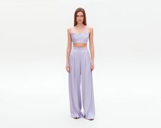 Lilac Satin Pants, Wide Leg Pants, Women Palazzo, Satin Trousers, Silk Pants, Silk Palazzo, Women Pants, High Waisted Pants,Purple Satin Set ⭐Size: Please write your chest, waist, hips, height, and we will make a pants to your individual measurements! After you place your order, we may ask you for additional measurements. We do this to ensure that the pants fits you perfectly👌😊 ⭐Our fabric: We have used a premium quality satin: it's light and soft, pleasant to wear and easy to wash.  ⭐Shipping: ✈️We have two shipping options that we can offer: Free Shipping and Express Shipping. ✅ Free shipping takes about two weeks. ✅ Express shipping takes only 8-10 days. An extra fee of $35 should be paid for this option. When placing your order, please, keep in mind that it will take us 3 to 6 busine Wide Leg Pants Women, Lavender Silk, Satin Set, Pants High Waisted, Satin Trousers, Satin Pants, Purple Satin, Women Pants, Silk Pants