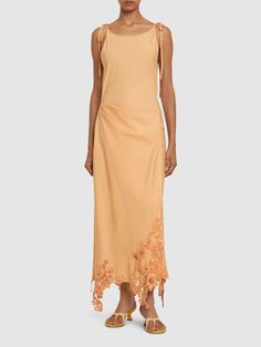 Self-tie spaghetti straps. Lace trim. Asymmetrical hem. Model is wearing a size36 Cotton Midi Dress, Dresses 2024, Luxury Dress, Dress With Lace, Shearling Jacket, Asymmetrical Hem, Swimwear Tops, Asymmetric Hem, Women's Dresses