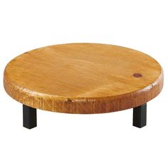 a round wooden table with black legs