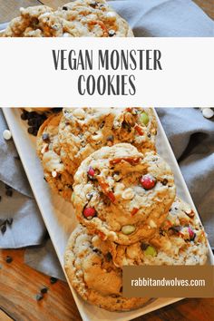 vegan monster cookies on a plate with text overlay