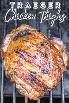 grilled chicken thighs on the grill with text overlay that reads traeger chicken thighs