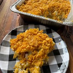 there is a casserole dish on the plate and another pie in the pan