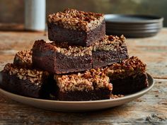 several brownies stacked on top of each other on a plate