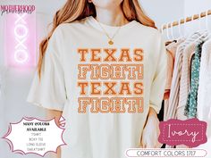 These trendy college football shirts with a burnt orange Texas Fight design are the perfect tailgate or game day gifts for your favorite UT Longhorns football fans, Austinites, or University of Texas students / alumni/ fans. You could gift this women's football tee during college football season, Fall, as a birthday gift, or a Christmas gift. Hook 'em! The design is available in a variety of sizes and colors in a high-quality Comfort Colors cotton tshirt and boxy tee, a premium quality Comfort C College Football Shirts, Game Day Gifts, Ut Longhorns, Longhorns Football, College Football Season, Texas Football, Orange Texas, Football Tee, Comfort Colors Sweatshirt