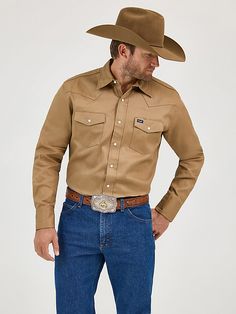 COWBOY STYLE FROM SUN UP TO SUN DOWN When the going gets tough, you'll be glad to know this shirt has your back. Wrangler® work shirts are a cut above the rest and they have certainly earned their credentials in the eyes of cowboys across the country. These hard-working wardrobe essentials come complete with all the authentic details you know and love about Wrangler® Western shirts, including a spread collar and spade flap snap pockets with snap closure as well as Western-inspired front and back Working Wardrobe, Rustic Sunflower Wedding, Wrangler Cowboy, Wrangler Cowboy Cut, Wrangler Shirts, Mens Cowboy, The Cowboy, Cowboy Style, Sunflower Wedding