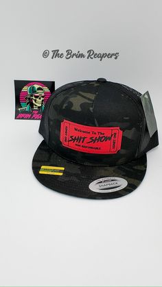 Product Overview Introducing the "Ticket to The Sh!T Show" hat, a bold and humorous accessory perfect for those who enjoy making a statement with their fashion. This hat features a red leather patch designed like a ticket, emblazoned with the phrase "Ticket to The Sh!T Show." Available in various styles including dad hats, truckers, baseball caps, and flatbills, this hat adds a fun touch to any wardrobe. Features  * High-Quality Materials: Crafted from durable fabric ensuring long-lasting wear and comfort.  * Bold Leather Patch Design: Features a red leather patch with the humorous phrase "Ticket to The Sh!T Show" that stands out.  * Versatile Styles: Choose from dad hats, truckers, baseball caps, and flatbills to suit your style.  * Adjustable Fit: Each hat includes an adjustable strap fo Patch Hat, Patch Design, To The, Funny Humor, Leather Patches, Baseball Caps, Hat Fashion, Suits You, Dad Hats