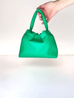 GET 10% OFF YOUR FIRST PURCHASE + FREE SHIPPING ON ORDERS OVER 150EURO exclusively at https://www.pittivintage.com/ and follow me on Instagram https://www.instagram.com/pittivintage/ and watch me in real-time during the process of making your bag. You'll see this bag is better than you expect! You'll love the size, the color, the cruelty-free material, and the top-notch handmade quality! With a removable strap, you can wear it as a crossbody during running errands and as a handbag for a night co Green Shoulder Box Bag With Dust Bag, Green Shoulder Box Bag, Green Handheld Satchel With Handle Drop, Green Satchel Bag With Handle Drop, Green Shoulder Bag With Handle Drop, Green Rectangular Pouch For Shopping, Green Box Bag With Double Handle And Removable Pouch, Green Rectangular Shopping Pouch, Daily Use Green Pouch With Dust Bag